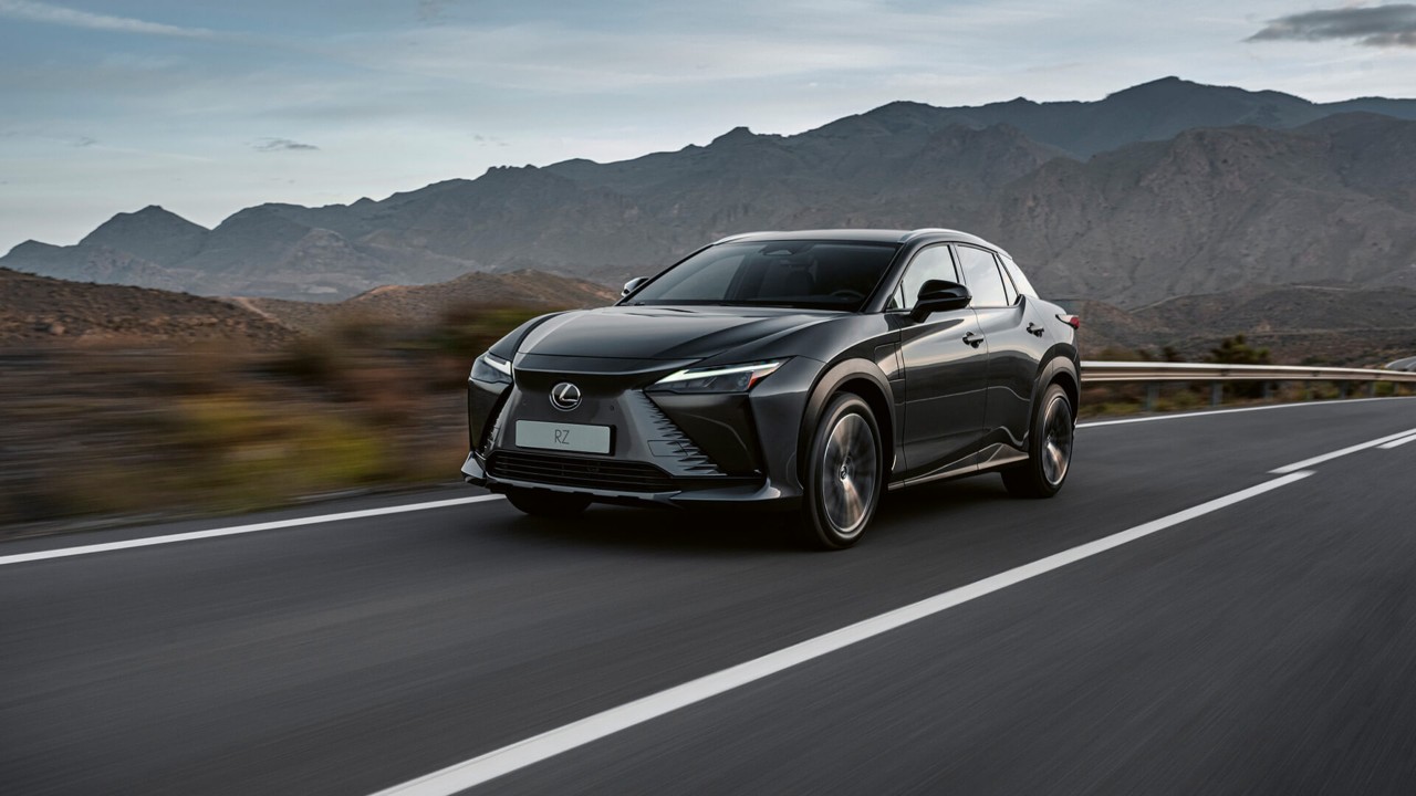 Lexus RZ 450e driving in a rural location