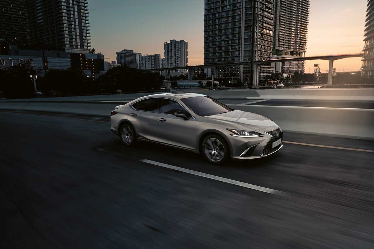 Lexus ES 300h driving on a road 