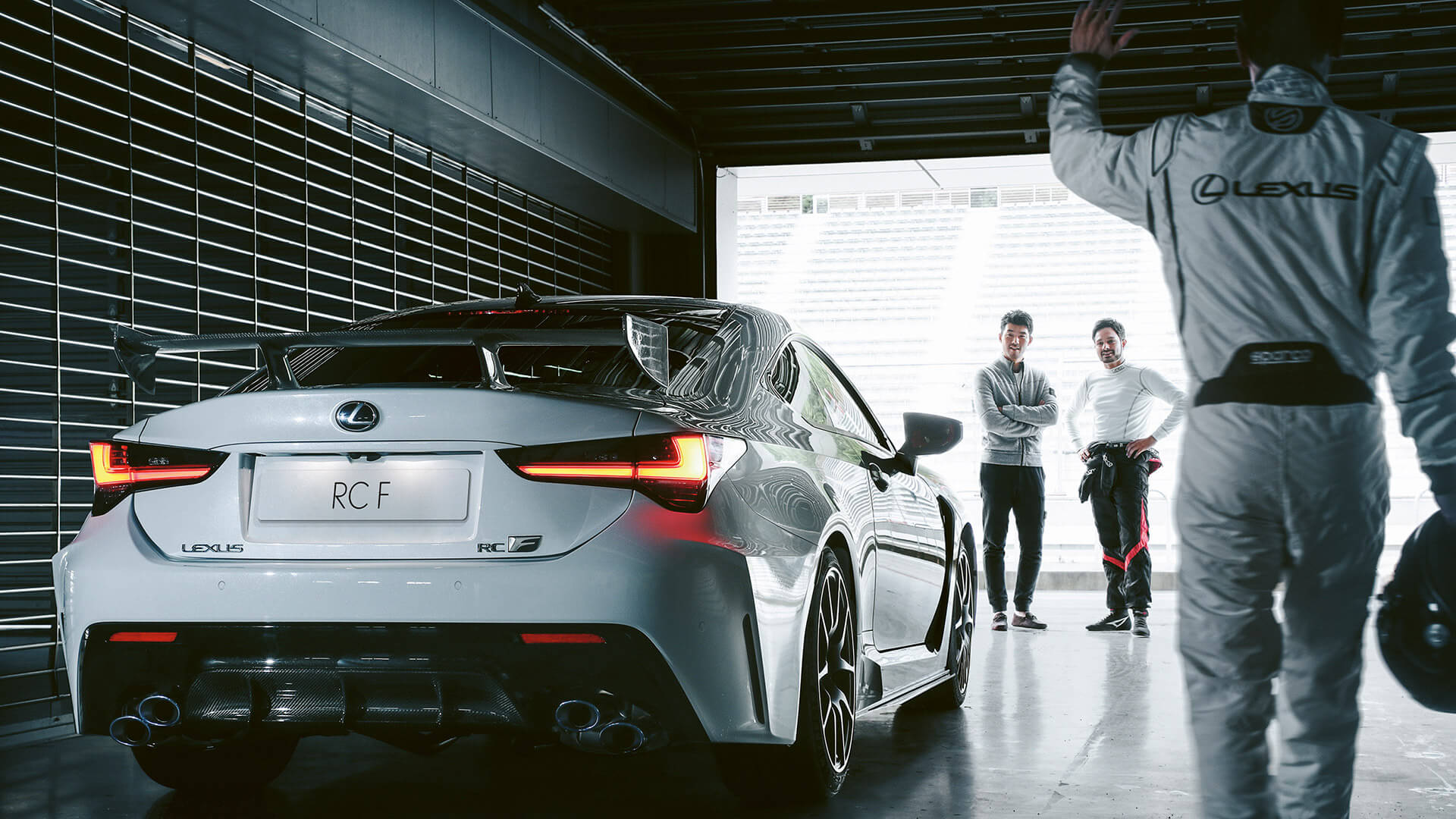 Lexus RC F parked in a race track garage 