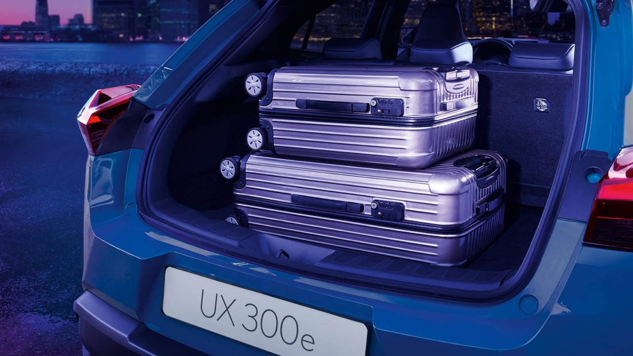 Multiple suitcases placed within Lexus UX 300e's boot 