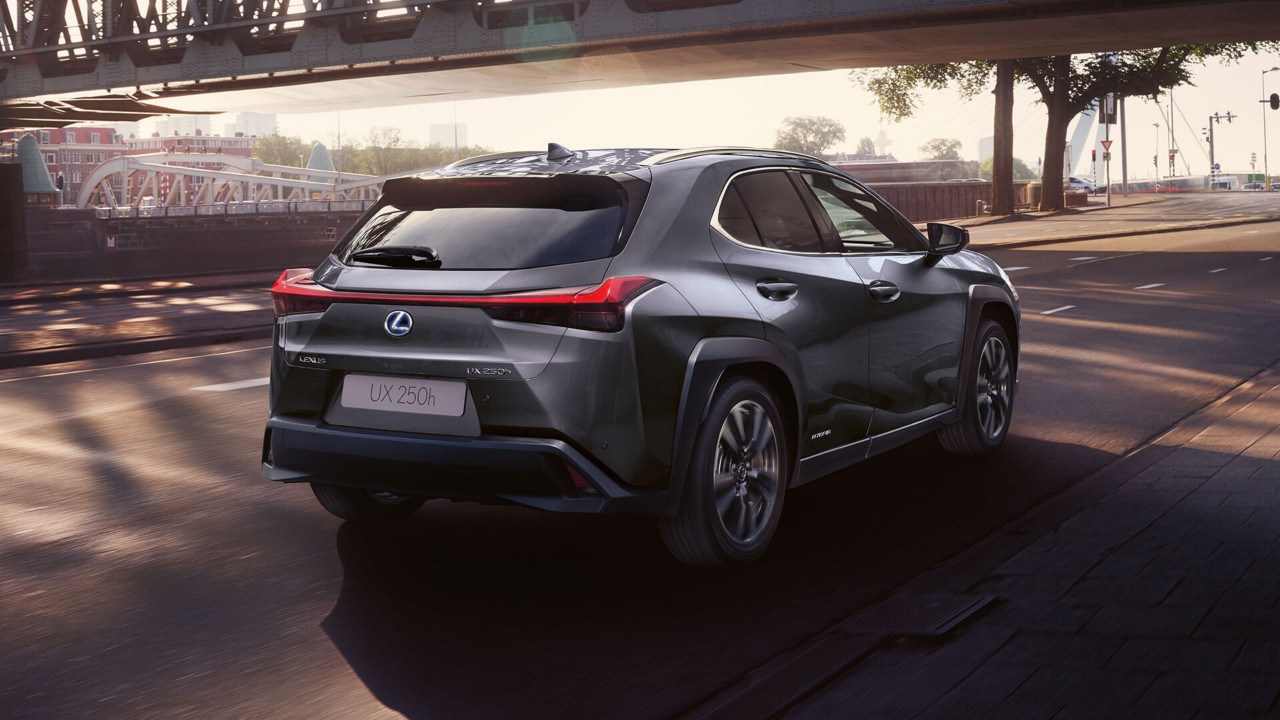 Lexus UX 250h driving in a town location 