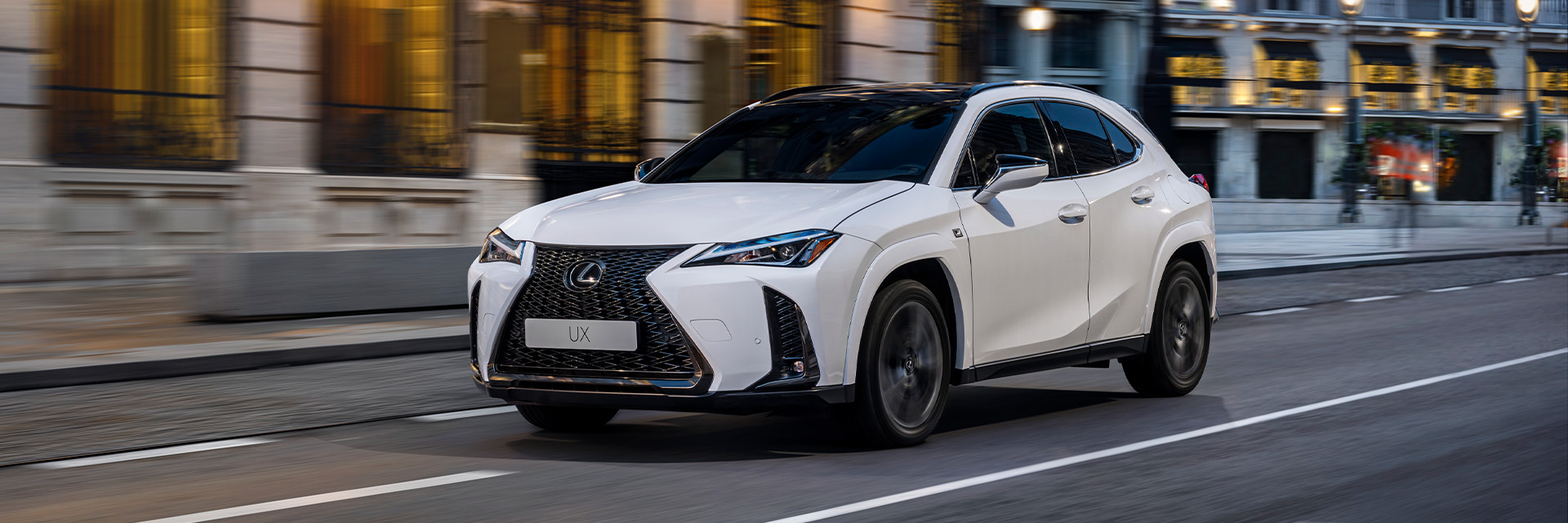 Lexus UX driving on a road